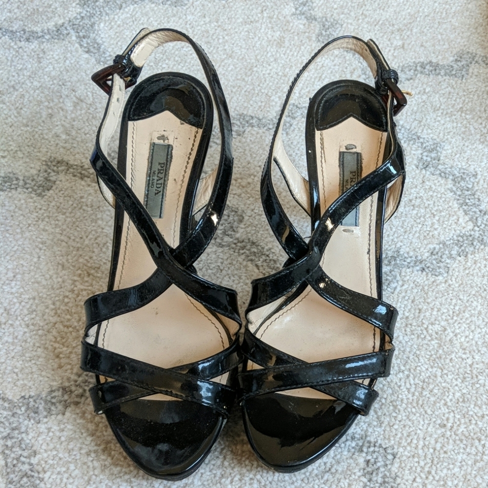 Prada. Strappy black patent sandal heel